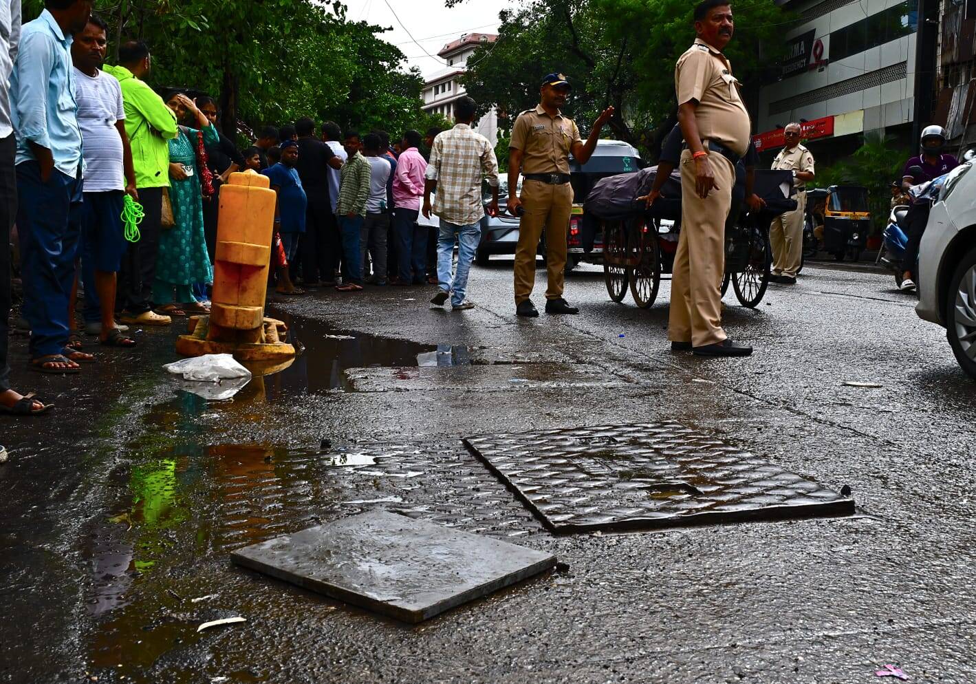 A man died after falling into an open manhole on Khairani Road in Sakinaka on Thursday (Image Credit Uma Kadam/TNN) -