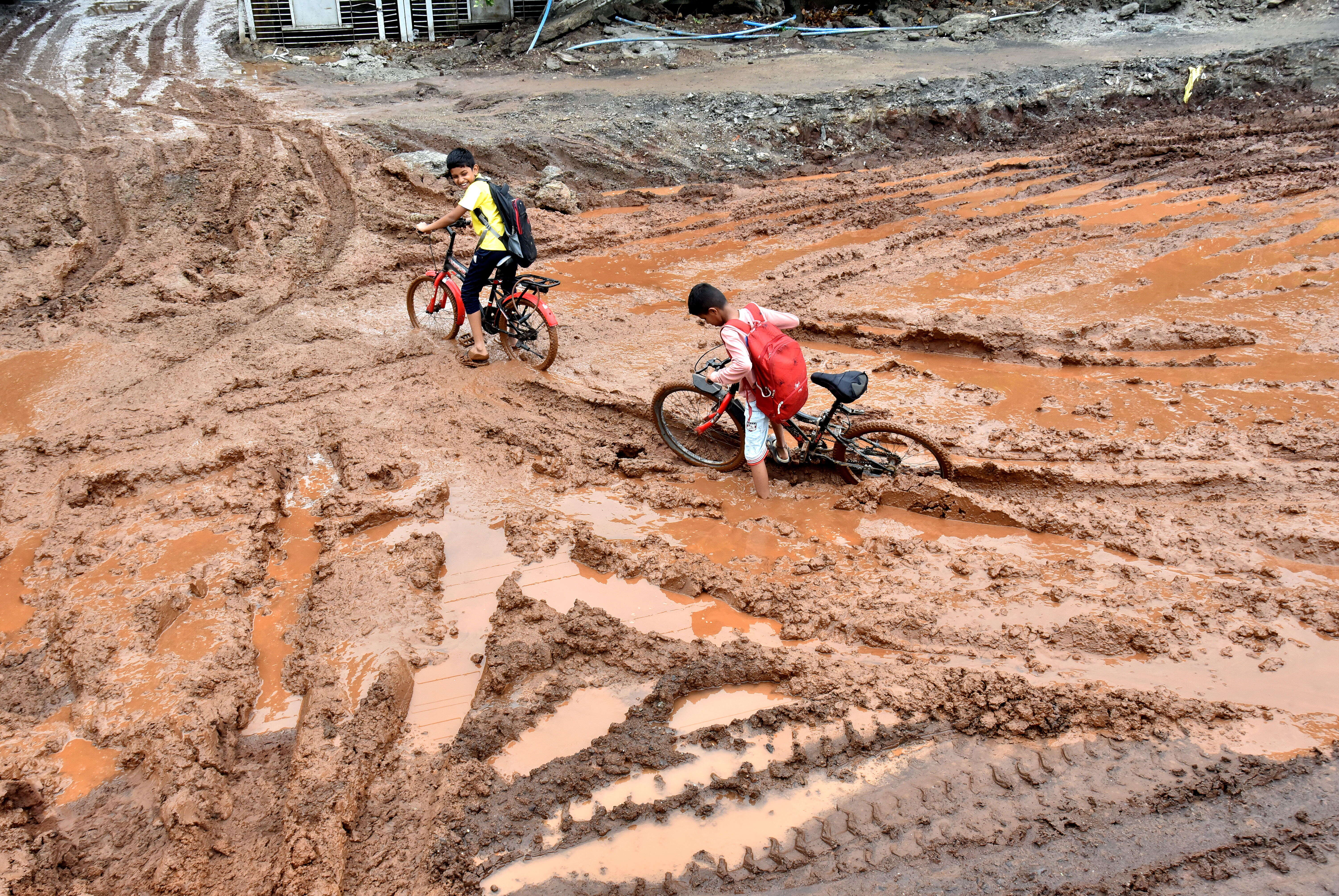 Dug-up stretches have become slushy death traps, particularly for two-wheeler riders 3867d49c-ee93-4e8c-a303-f3a5c8f61cb9_Rain_Water_loging_12__.JPG