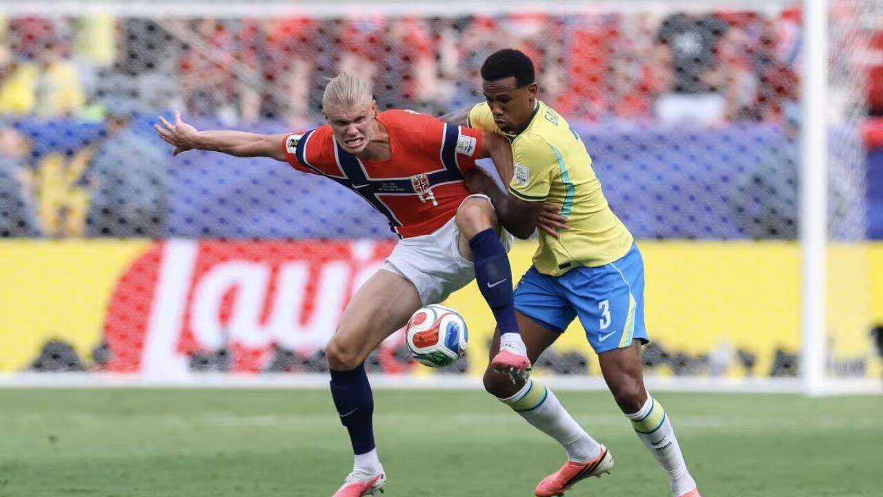 Buda Mendes/ Getty Images Haaland against Gabriel Magalhães of Brazil