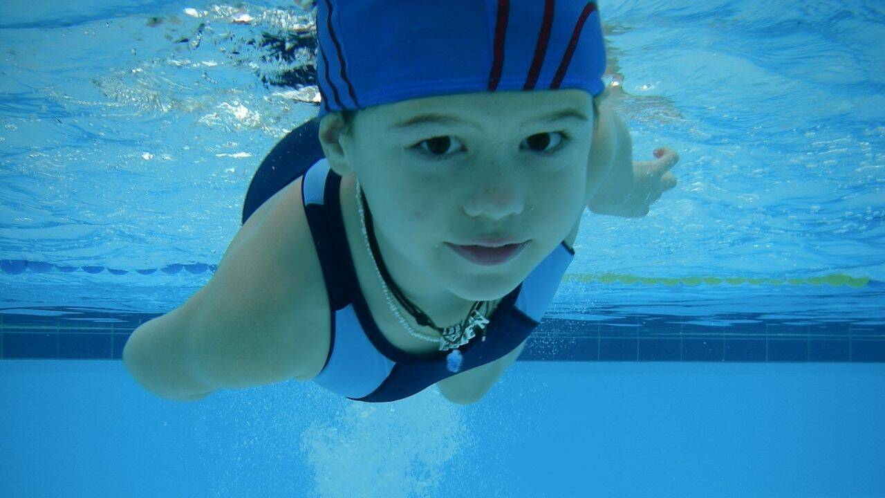 Child swimming underwater