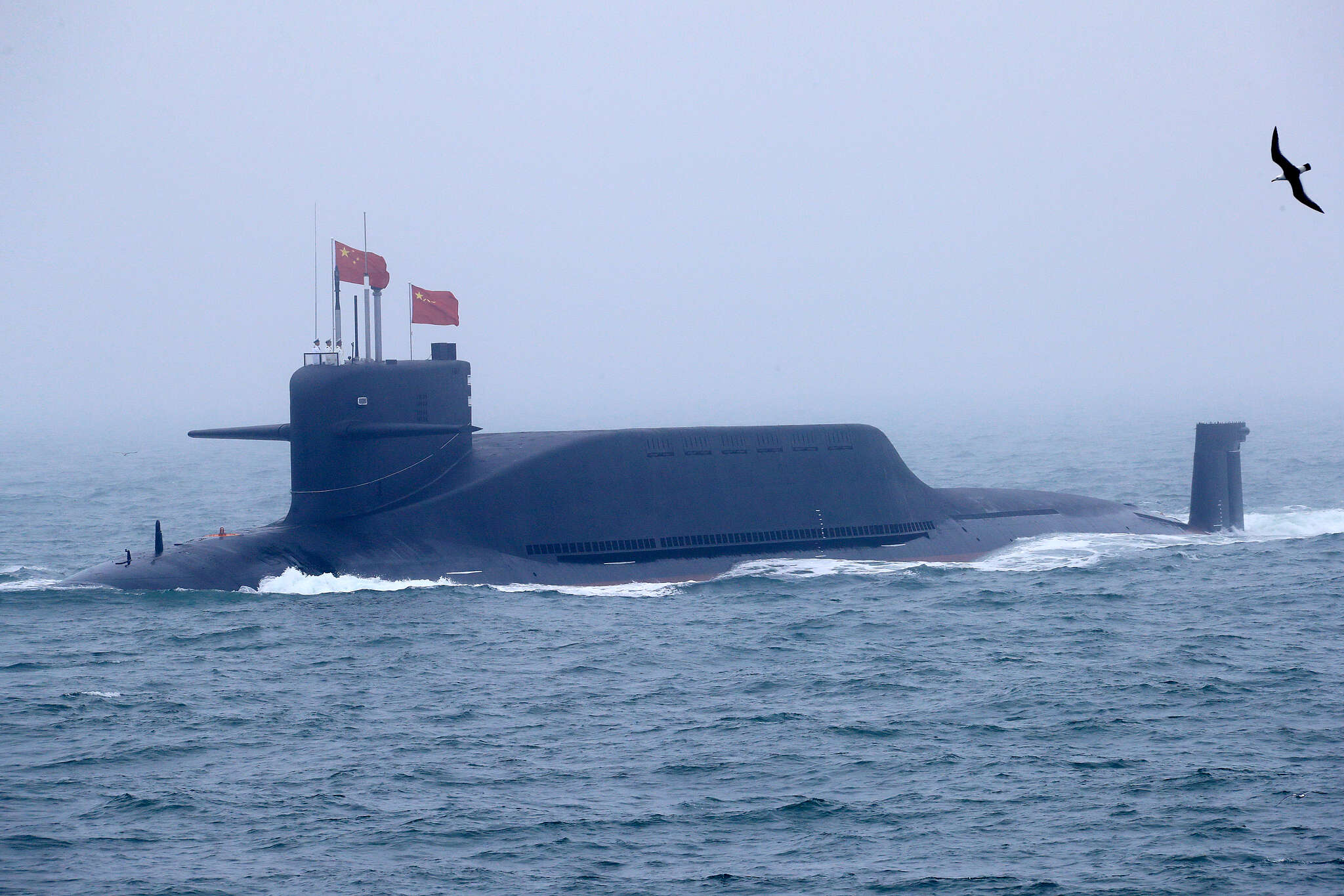 China test fires missile into Pacific, sparks alarm
