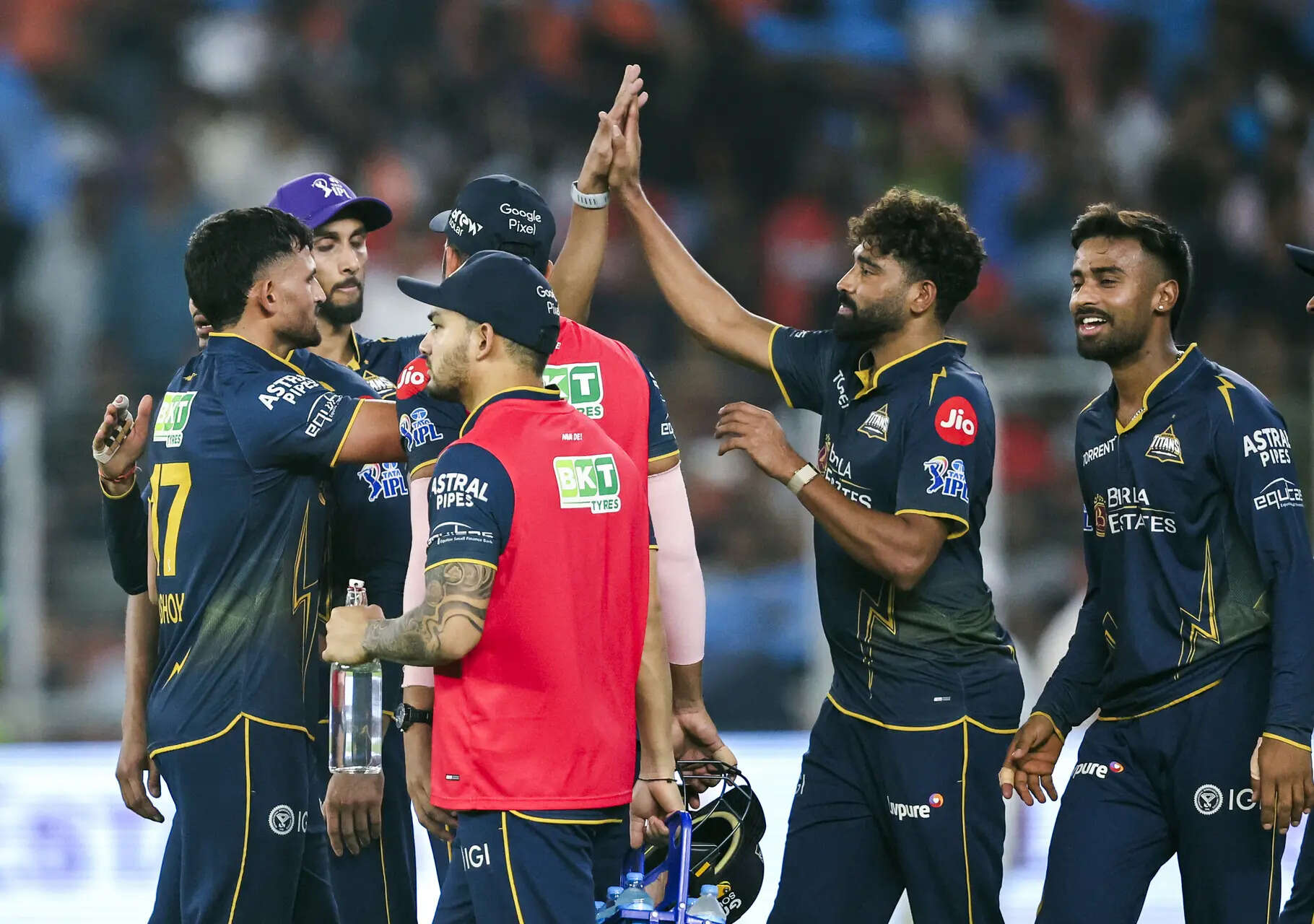 Ahmedabad, April 17 (ANI): Ashok Sharma of Gujarat Titans celebrates with teammates...