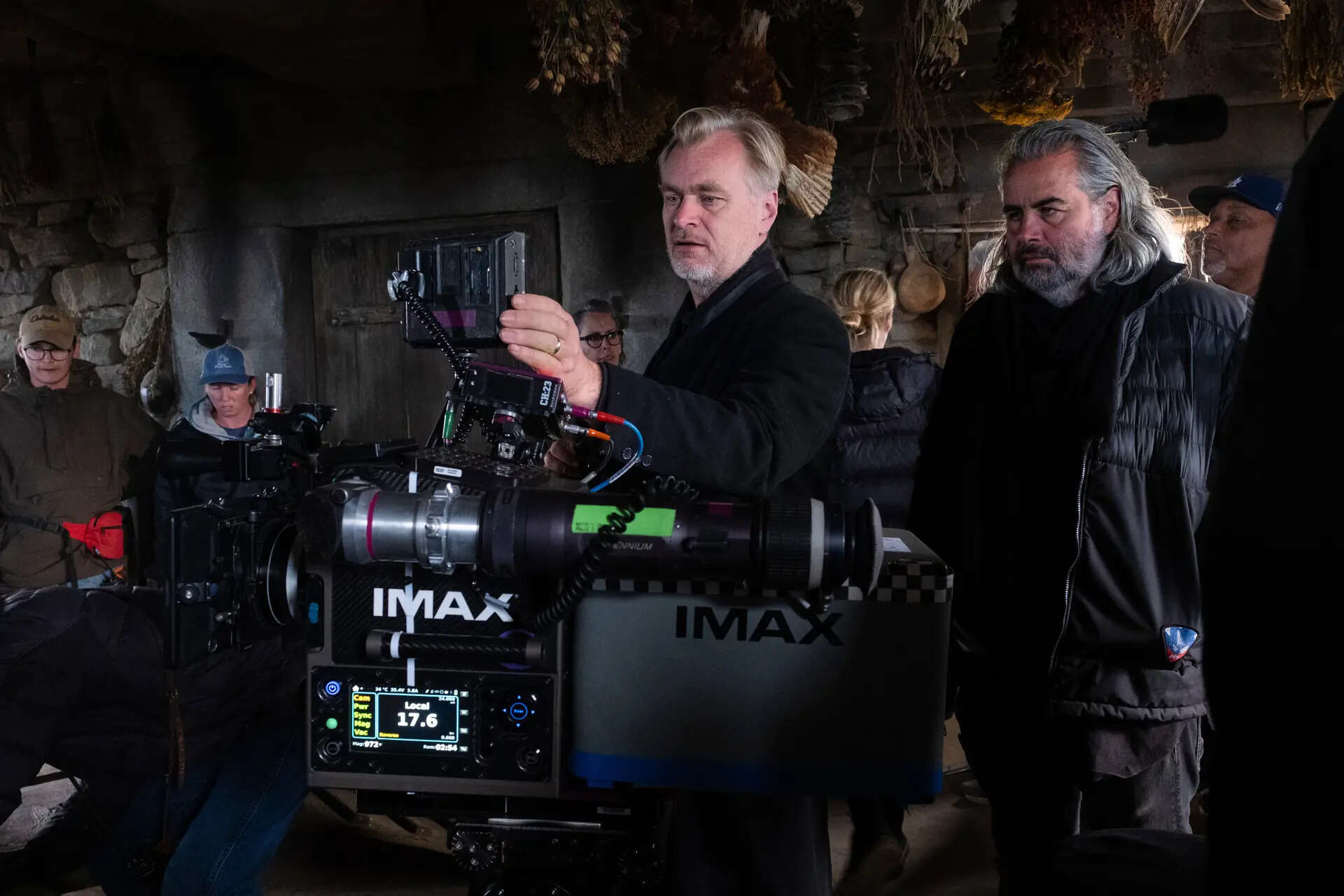 This image released by Universal Pictures shows director Christopher Nolan, center, with cinematographer Hoyte van Hoytema on set of "The Odyssey." (Melinda Sue Gordon/Universal Pictures via AP) Behind Christopher Nolan’s 6-country epic undertaking to bring ‘The Odyssey’ to the big screen