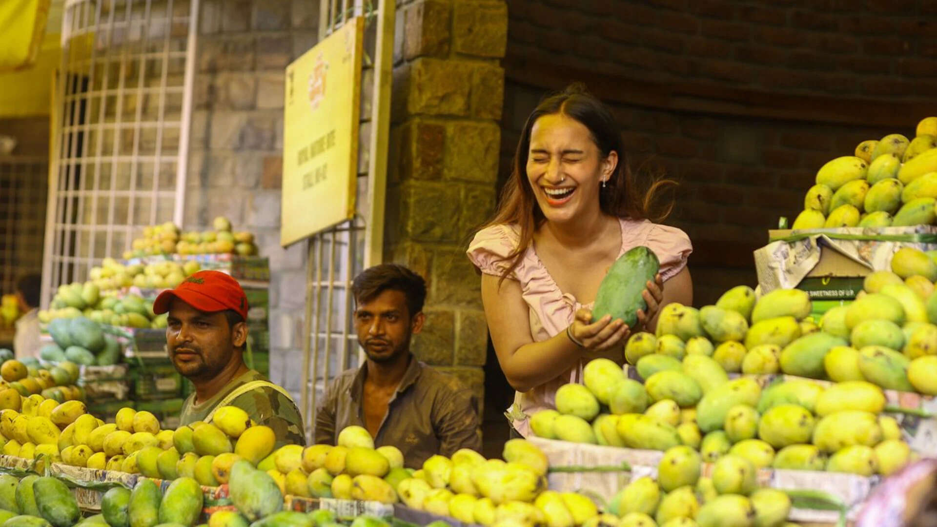 Visitors were seen clicking pictures with the dancing mango and vibrant displays