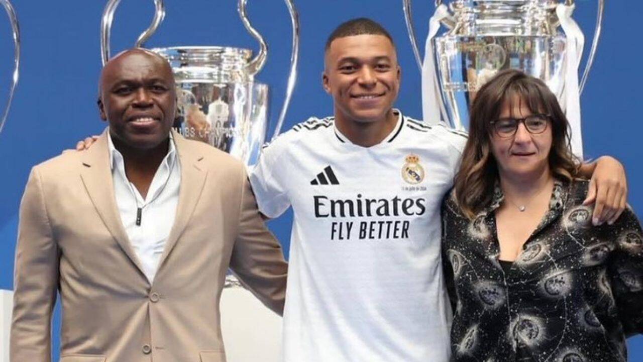 Kylian Mbappe with parents