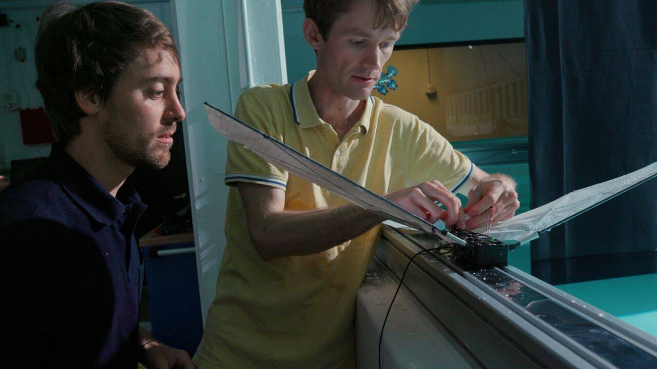 Raphael Zufferey (left) and Moritz Hüsser (right) work on their robot design