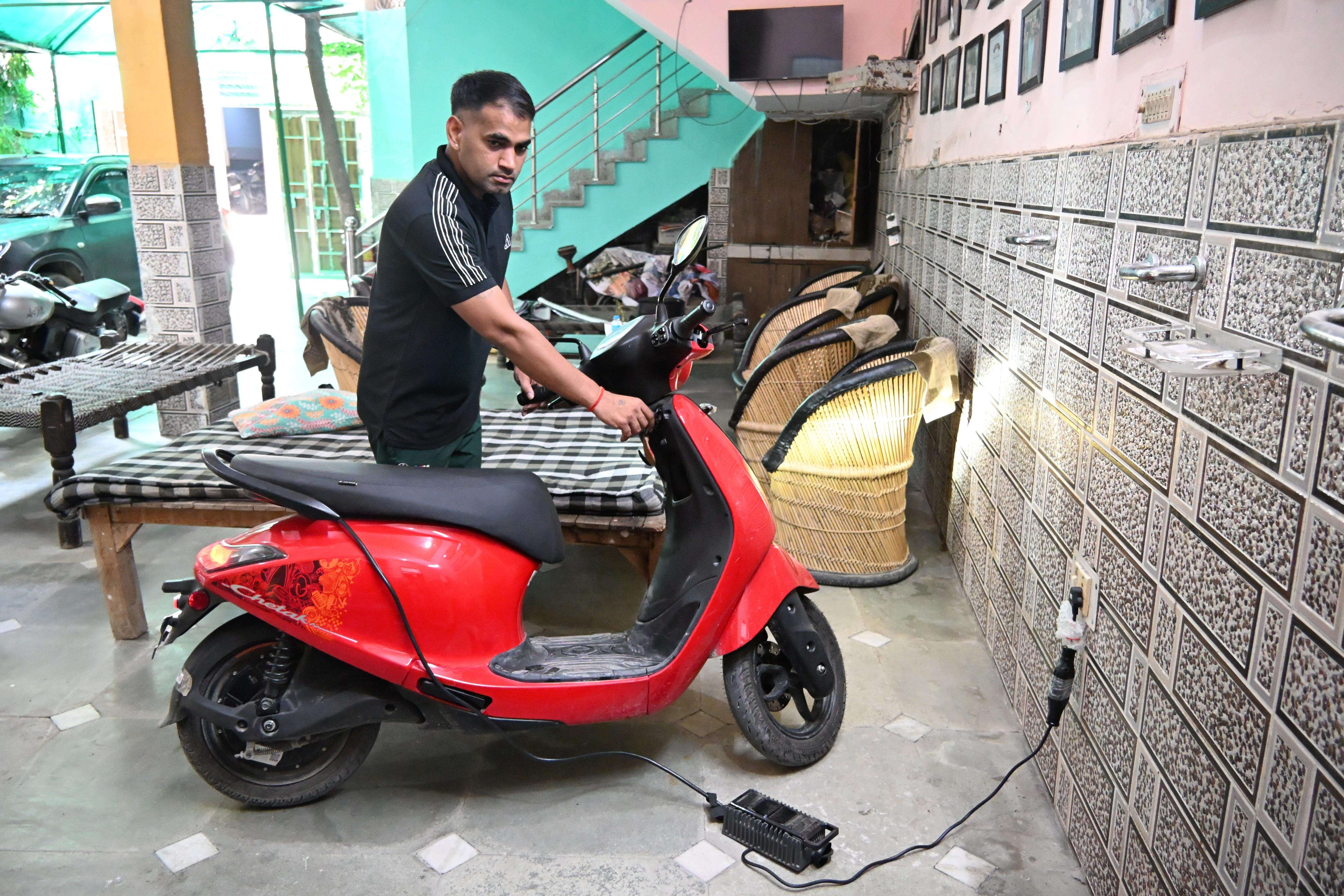 1 People charge their scooters inside their homes in Sector 51 Hoshiarpur (2).JPG