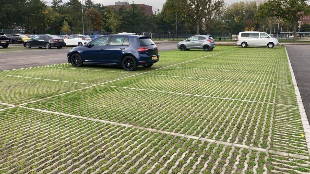 Dutch cities are replacing solid concrete surfaces with grass-filled paving blocks that absorb rainwater and help keep urban areas cooler