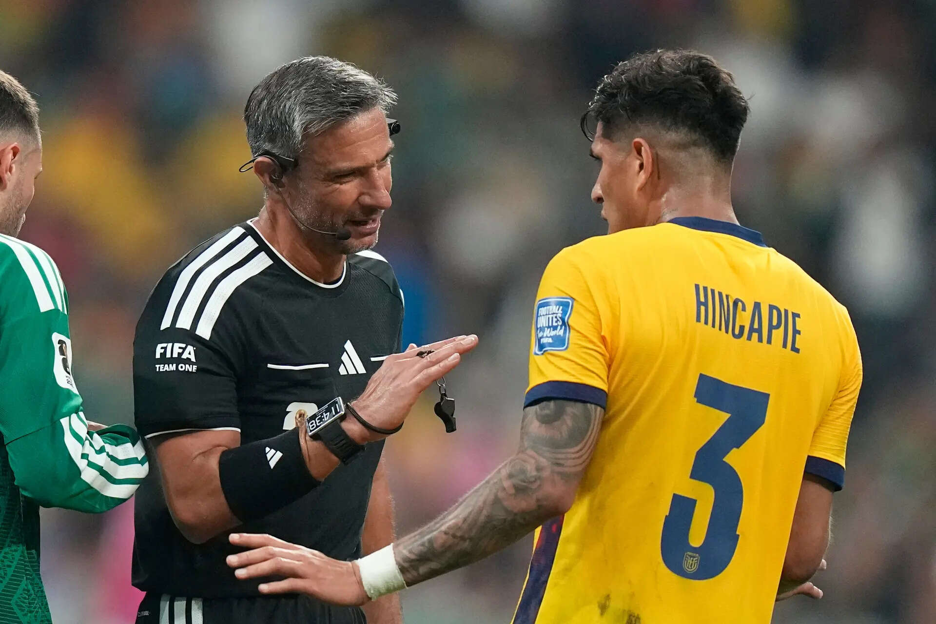 Why are World Cup refs giving red cards to players covering their mouths when confronting opponents?