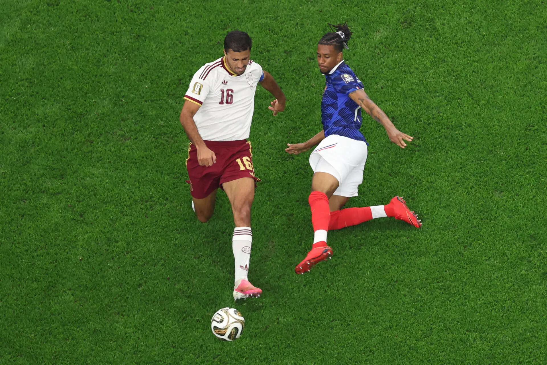 France's Michael Olise (11) tackles Spain's Rodri (16) during the World Cup semifinal soccer match between France and Spain in Arlington, Texas, near Dallas, Tuesday, July 14, 2026. (AP Photo/Sam Hodde) Rodri the maestro