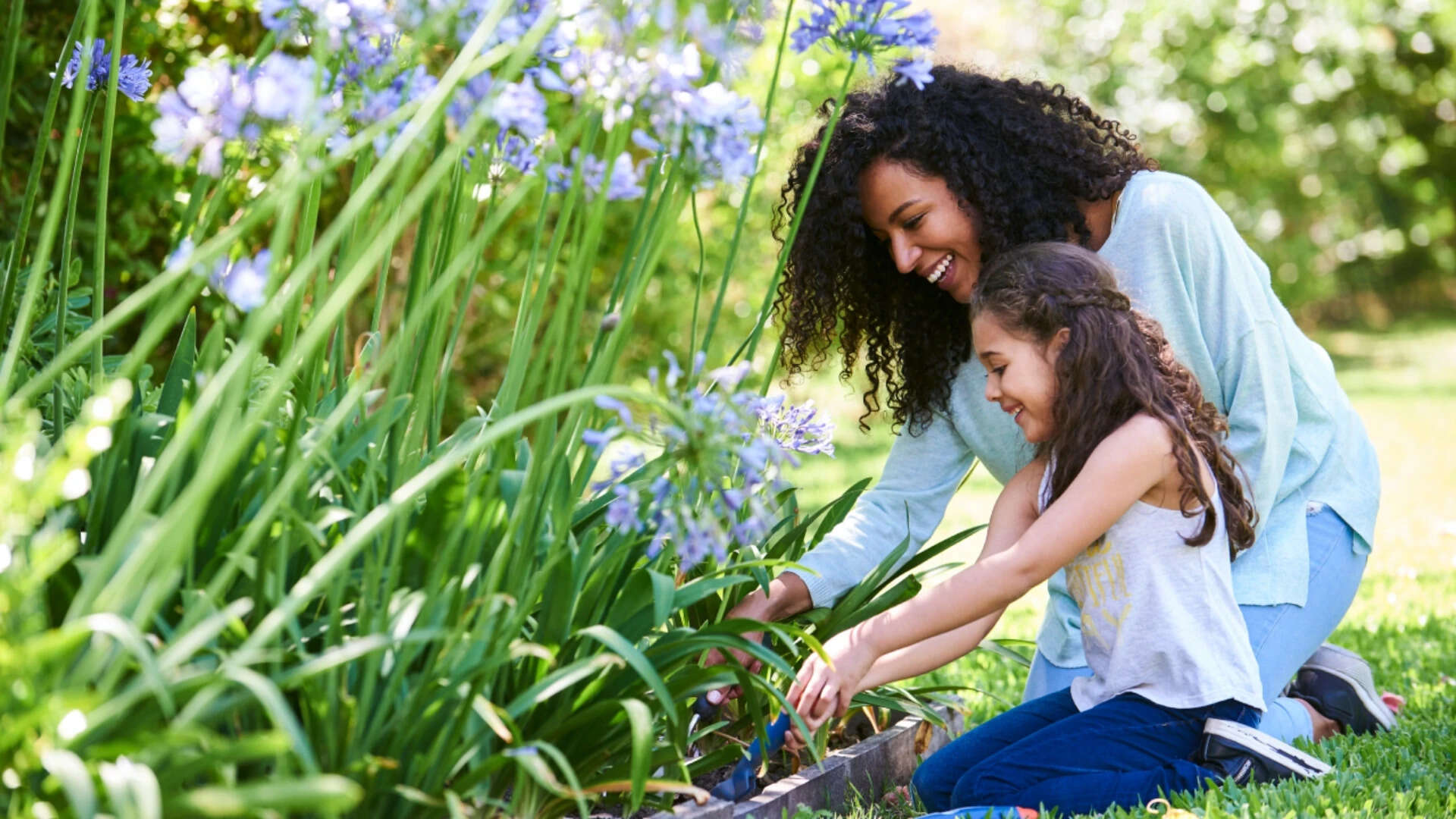 mom and daughter gardening