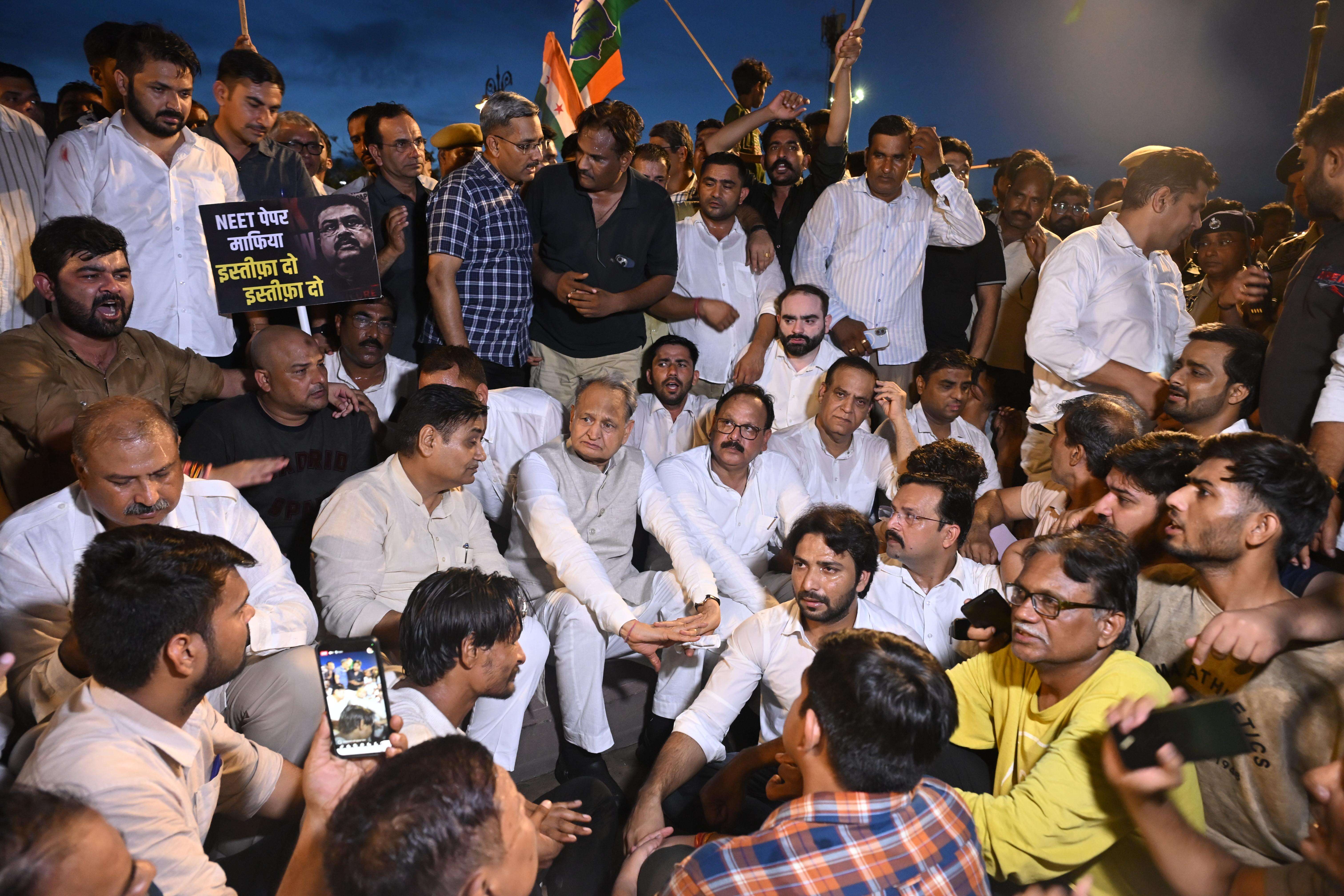 Former CM Ashok Gehlot and PCC Chief Govind Dotasara with party workers protested against NEET Paper Leak at Ambedkar Circle in Jaipur Tuesday (12).JPG