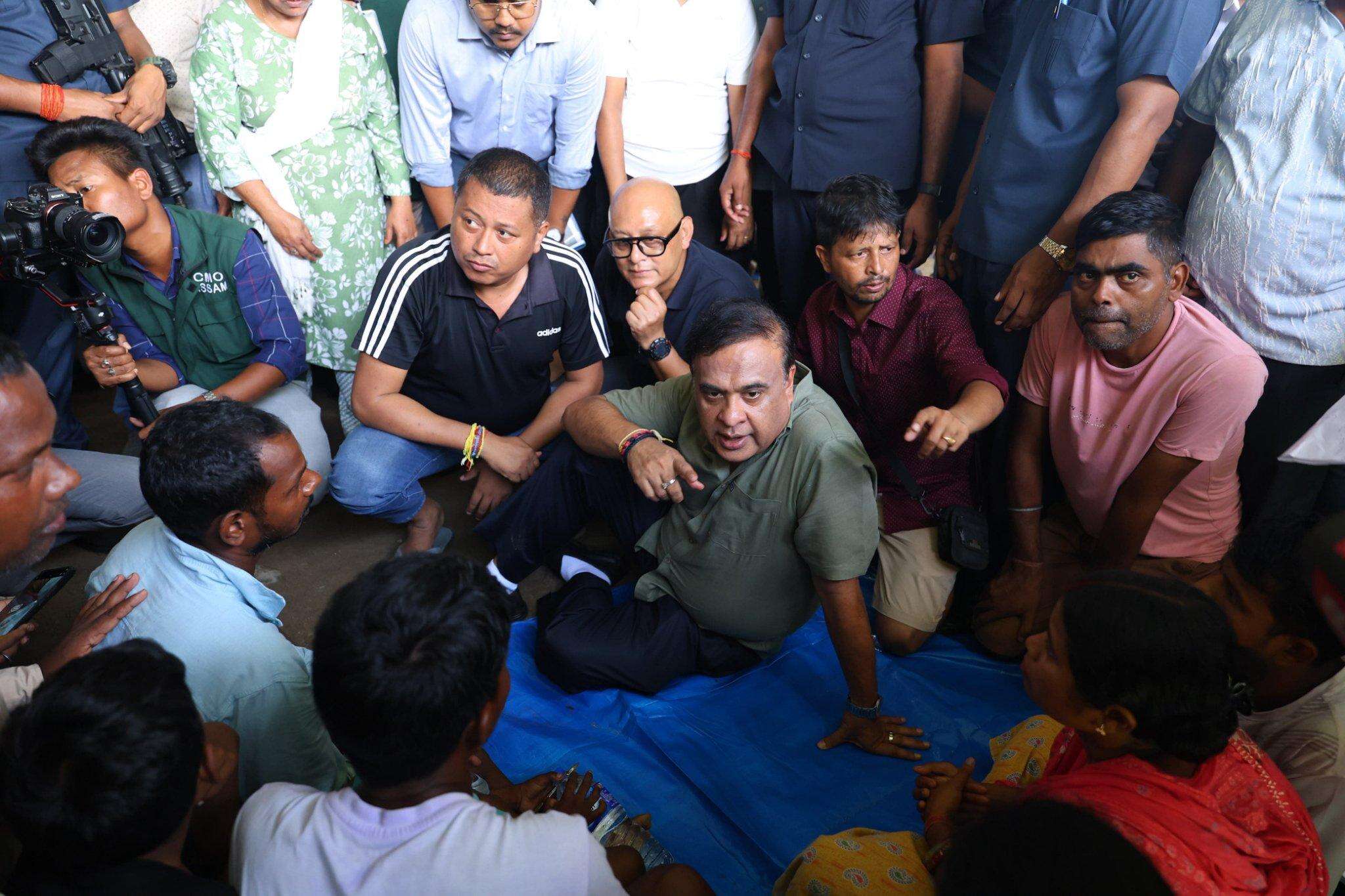 CM Himanta Biswa Sarma talking with flood affected people at a relief camp.jpeg