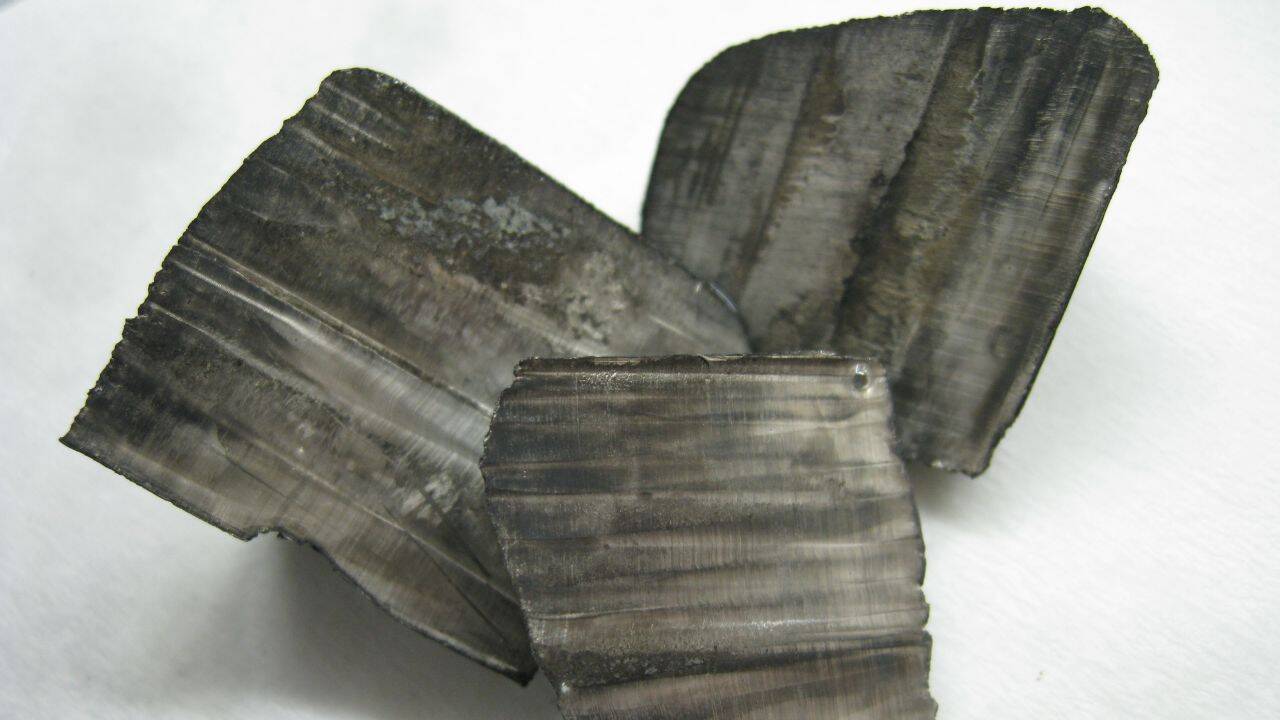 Why do green minerals pose a different threat compared to coal and gold