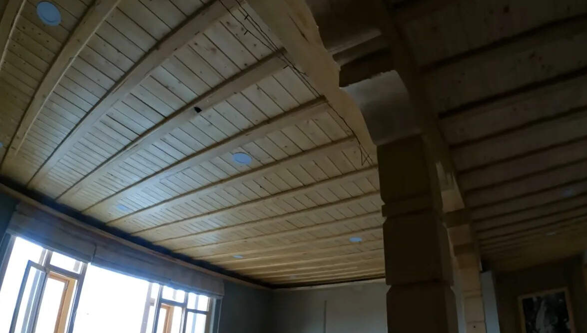 While-the-walls-are-made-of-mud-the-ceiling-is-of-wood.