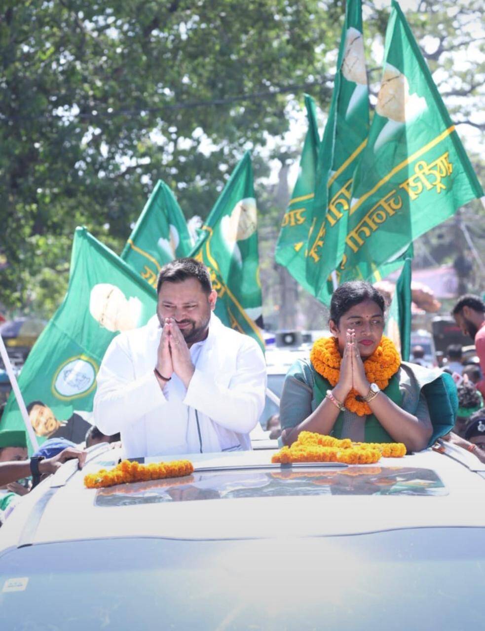 c72cdfd9-95af-435e-b651-5d208ff42848_RJD_national_working_president_Tejashwi_Prasad_Yadav_and_party_candidate_Rekha_Gupta_during_a_roadshow_in_Patna_on_Monday.jpeg