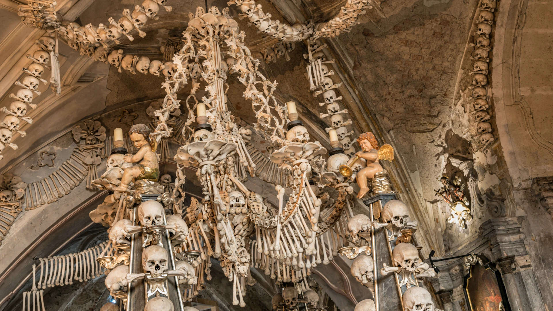 Chandelier made from human skulls and bones in Sedlec Ossuary in Kutná Hora
