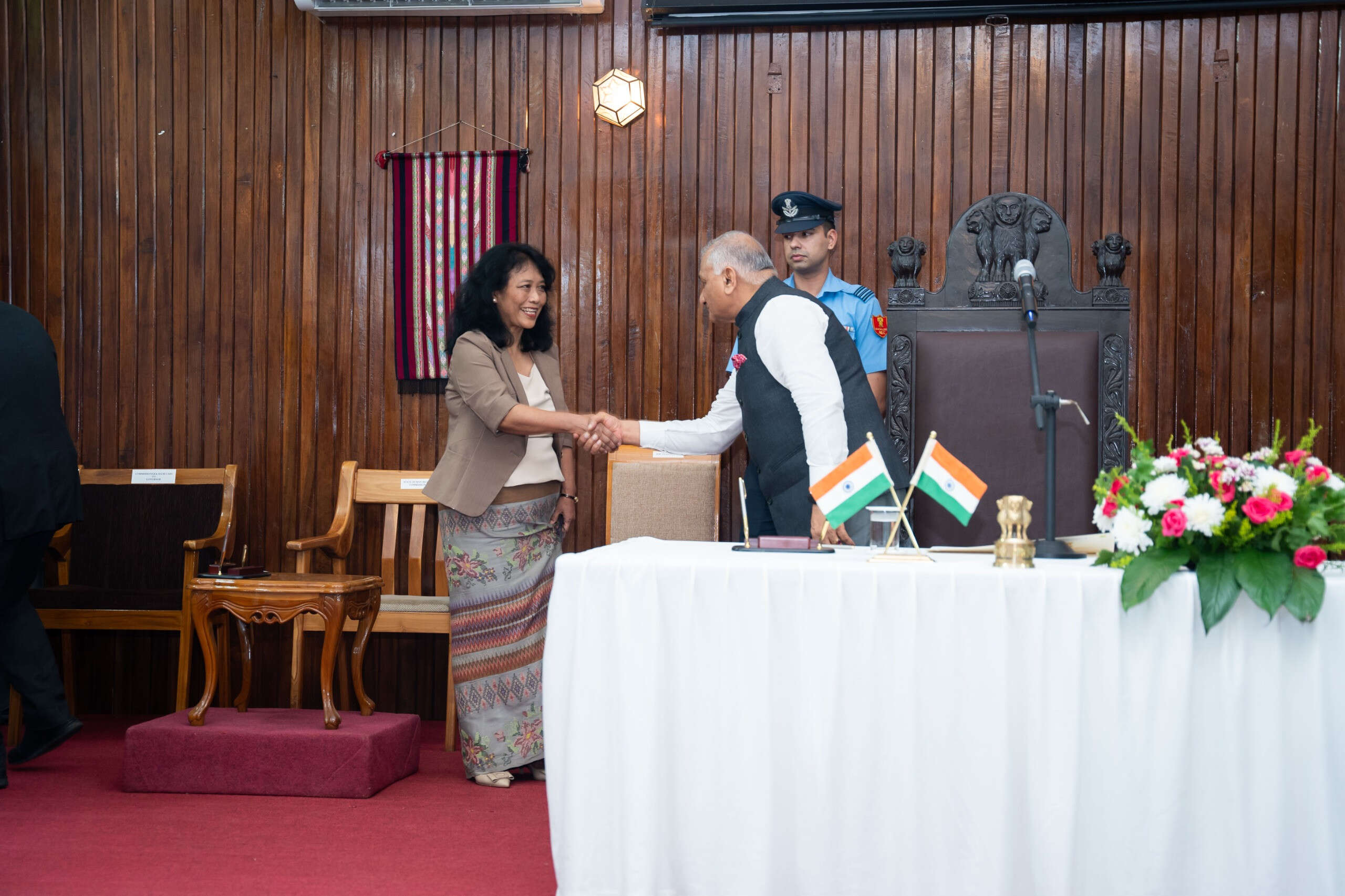 9cd01969-3201-4a47-bf0a-e8e1e778bd0a_Governor_Gen._VK_Singh_shakes_hand_with_Marli_Vankung_after_the_latter_is_sworn-in_as_chairperson_of_the_Mizoram_SHRC..jpeg