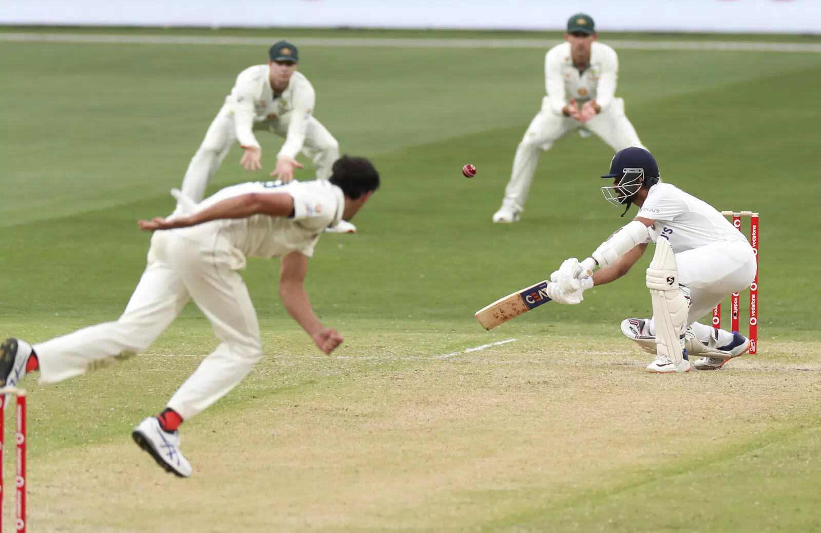 Melbourne : India's Ajinkya Rahane reaches to hit the ball during play on day tw...