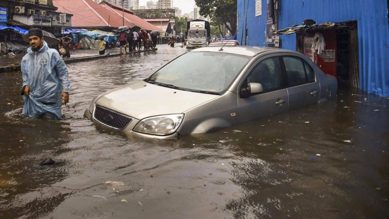 Car in floodwaters (PTI Photo)