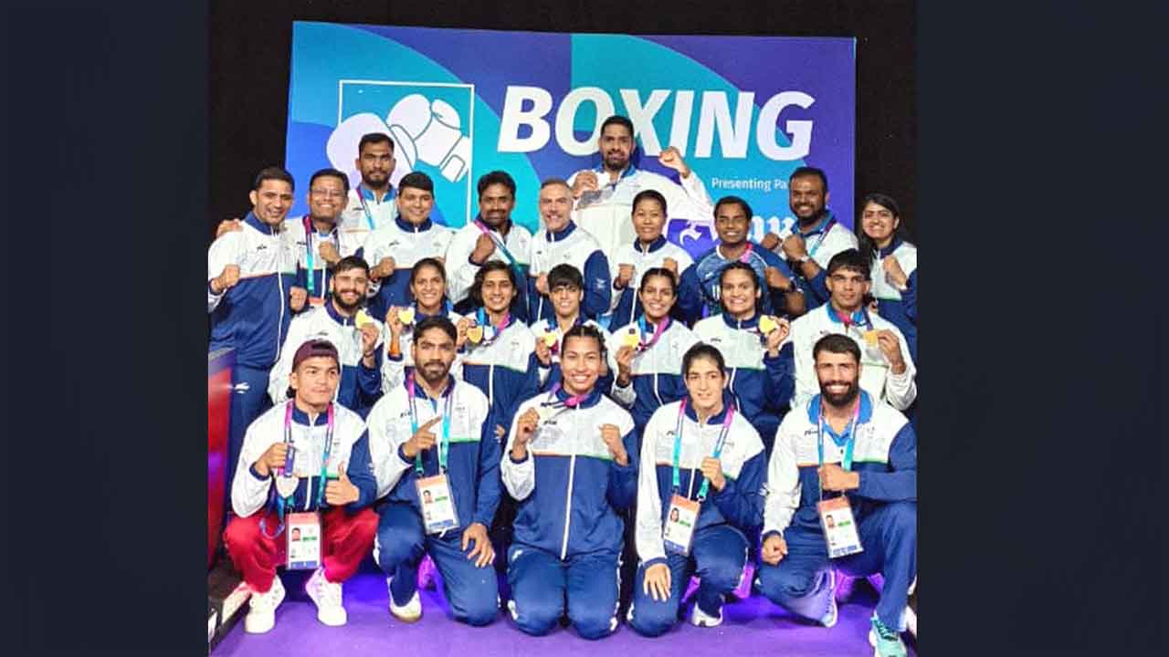 It's not Olympics, but these are good medals: Boxing coach Nieva
