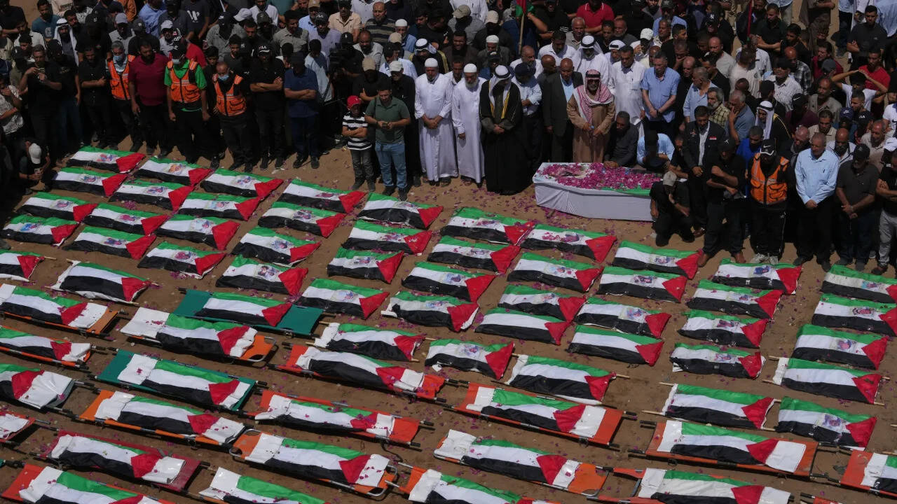 Gaza mass funeral for 112 Palestinians, including children, recovered from 2023 strike