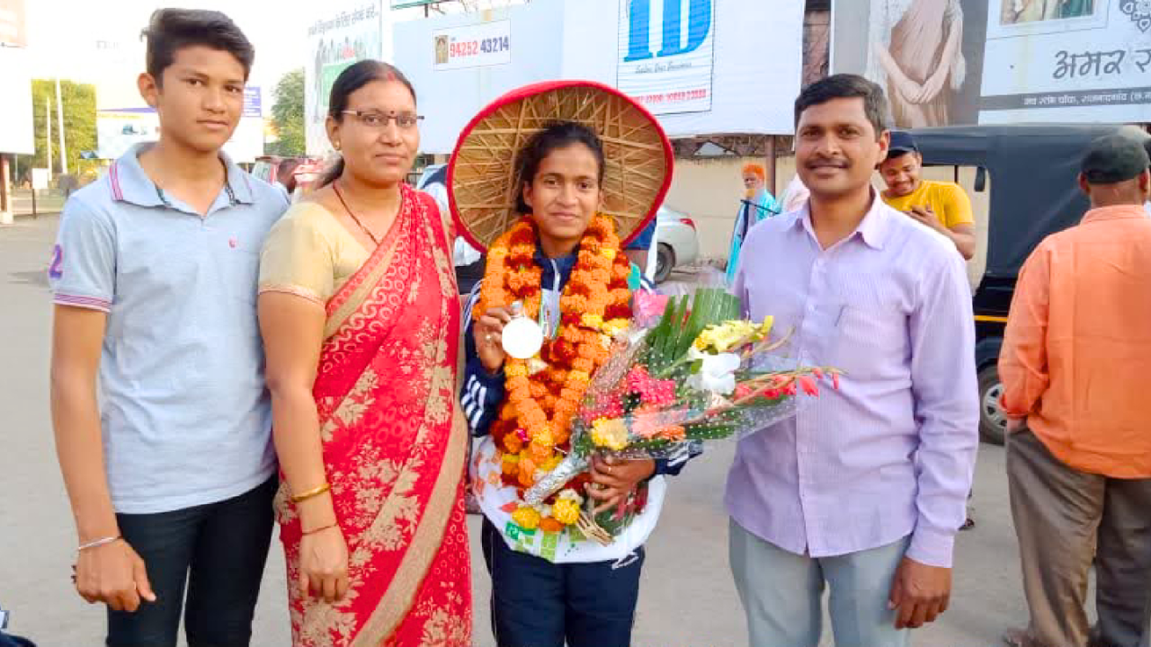 Gyaneshwari Yadav with parents in her younger days.