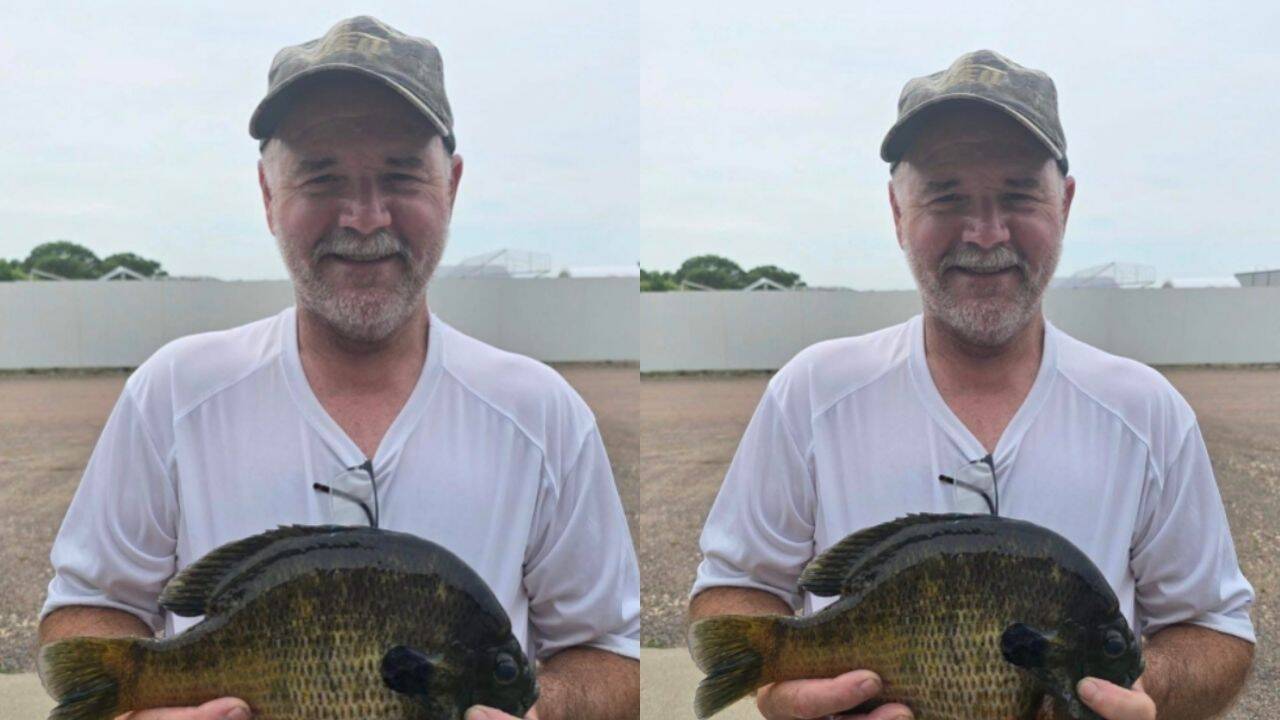 Dale Hoffman with fish<br>