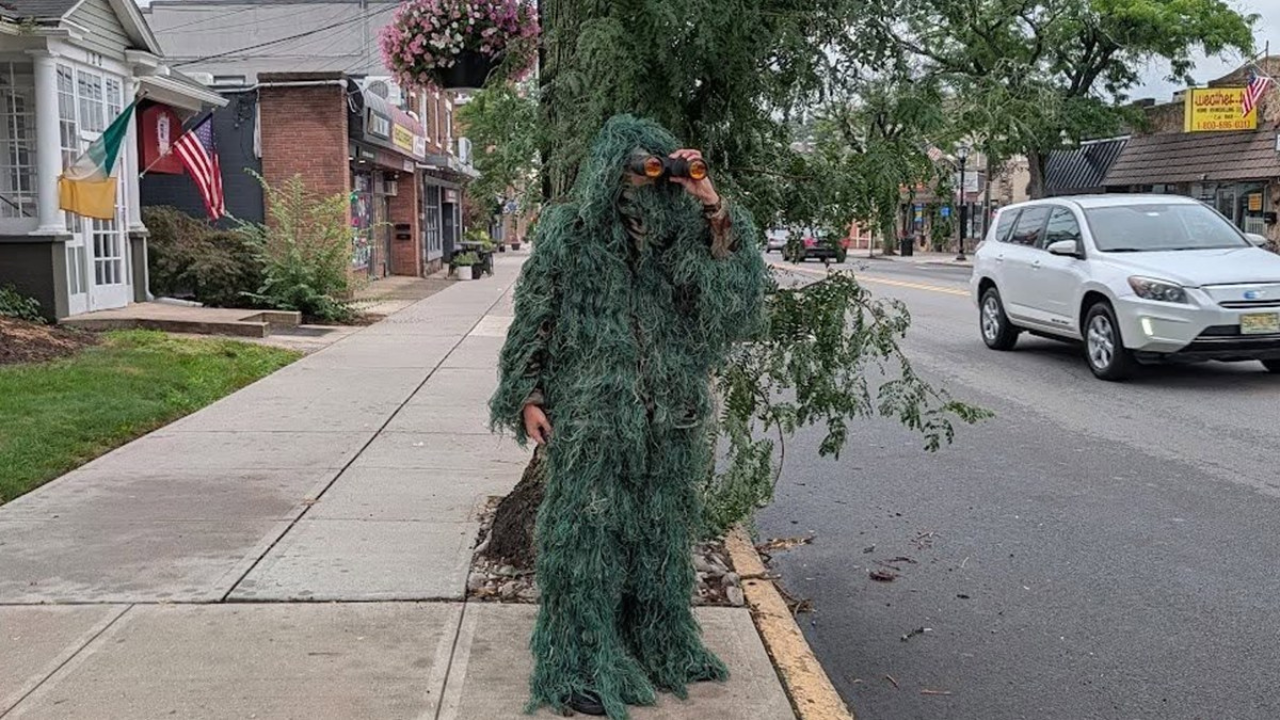 New Jersey police officer disguised as a roadside tree catch 74 distracted drivers