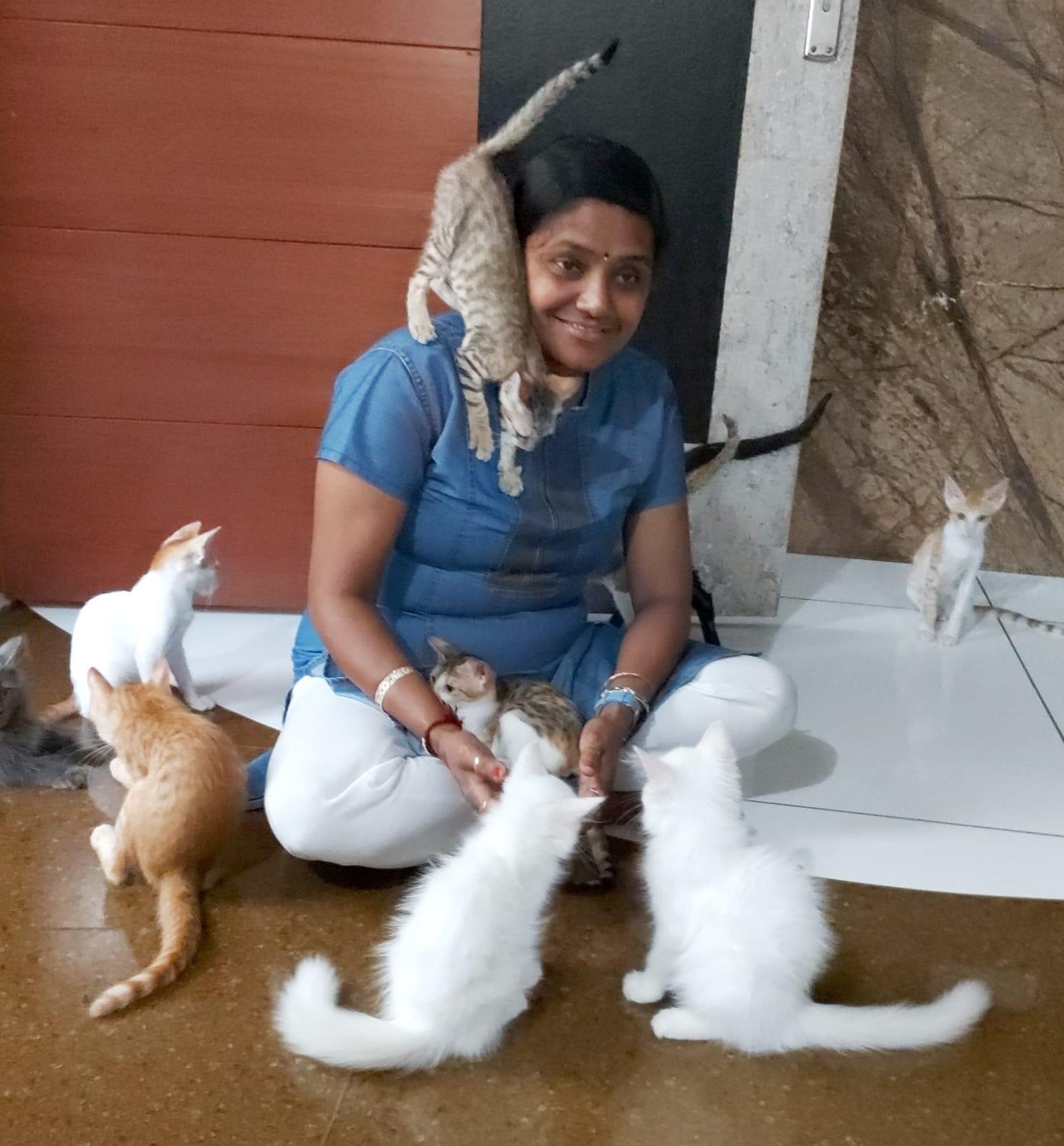 Pooja with cats.jpeg