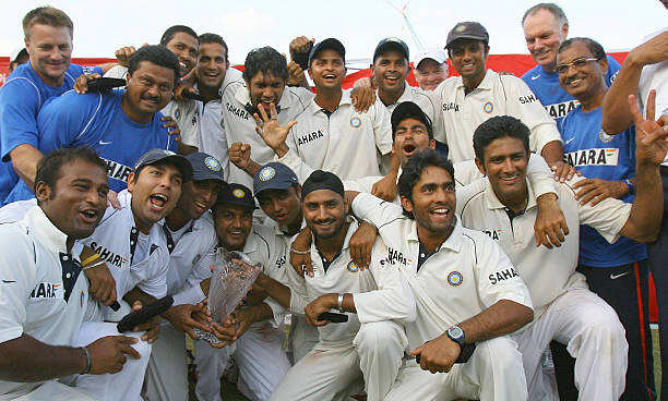 Indian team members pose with the trophy after winning the fourth and final test match at the Sabina Park stadium in Kingston, Jamaica, 02 July 2006. (Photo/Getty)