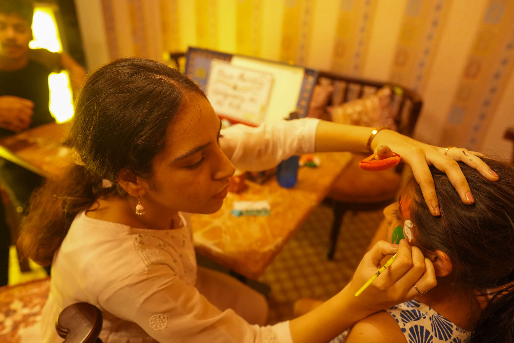 Between flying kites and watching fireworks light up the skyline, participants had tricolour tattoos painted on their faces
