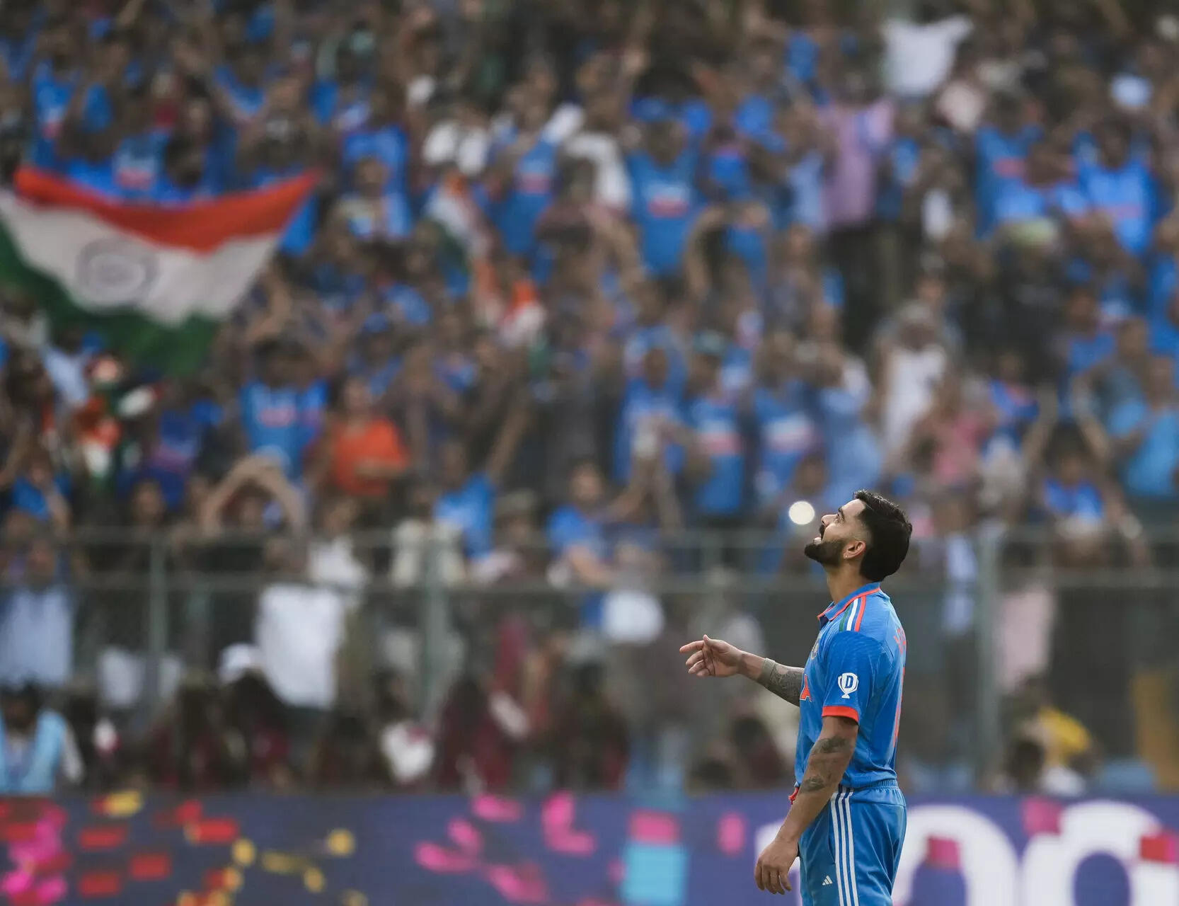 Mumbai: India's Virat Kohli celebrates his 50th century, breaking Sachin Tendulk...
