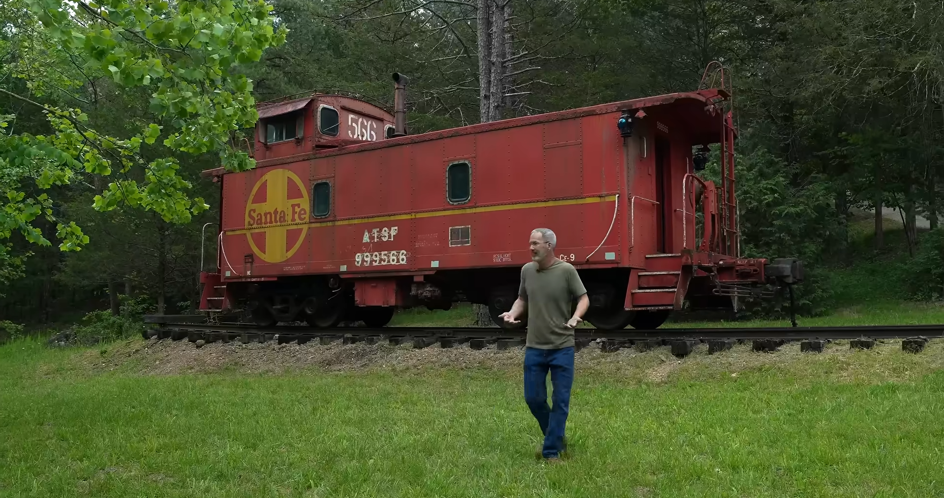 A 58,000-pound relic: A vintage railroad caboose sits on the property after being transported and lifted into place with cranes.