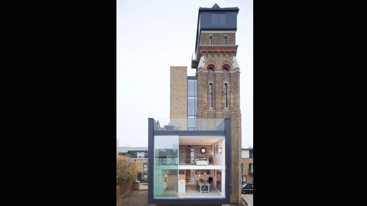 A British couple bought a derelict 85-foot, seven-storey Victorian water tower at auction