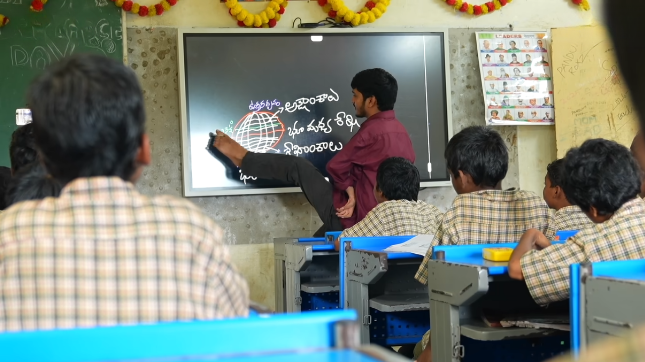 He was born with disability in both hands; today, he is a government teacher who writes with legs