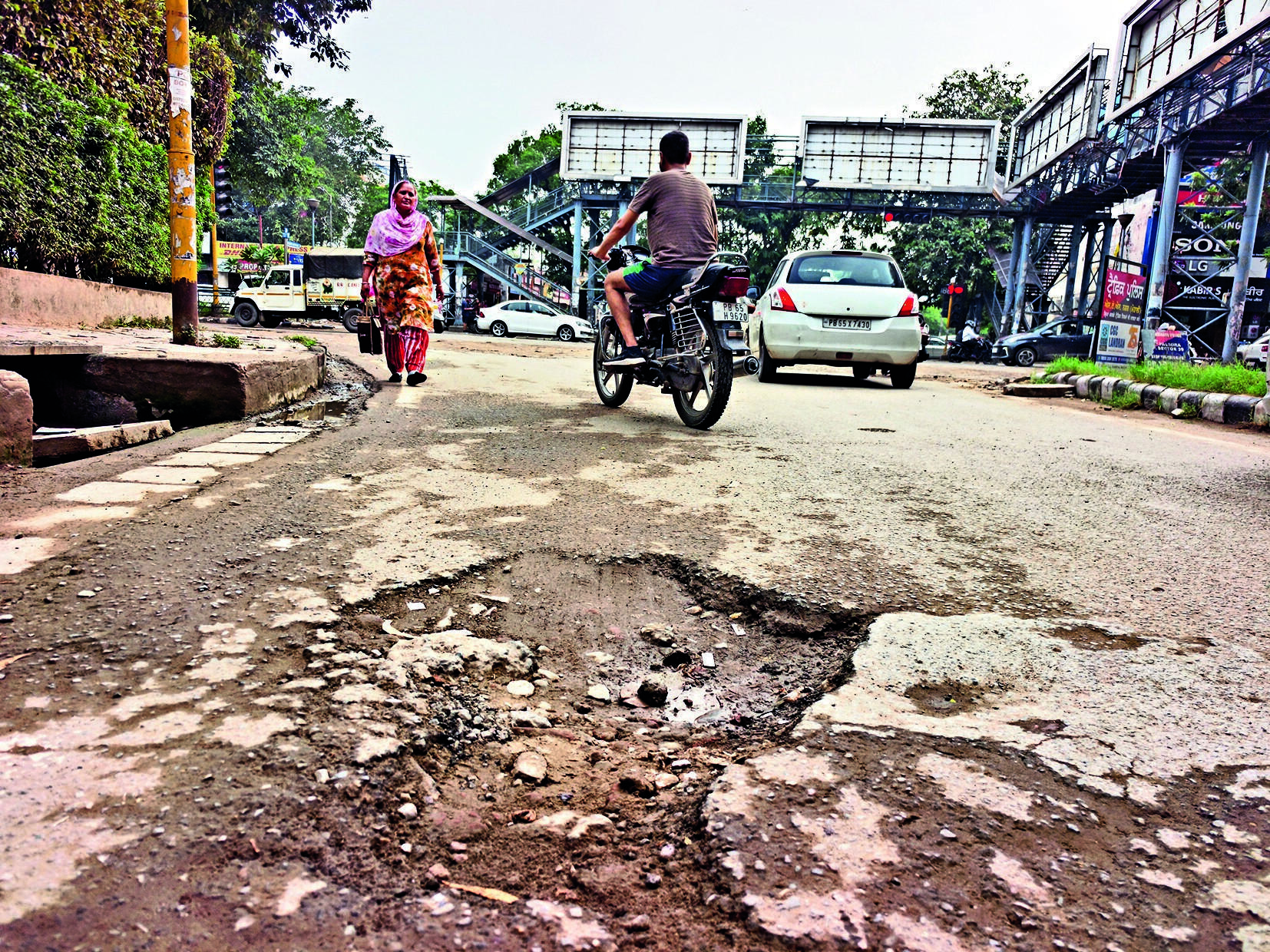 Potholes put civic claims to test
