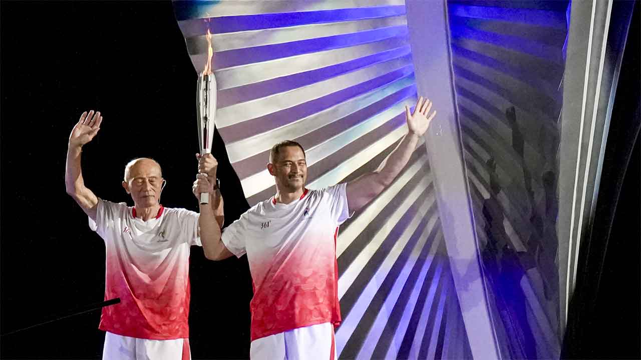 Father-son duo makes history: Shigenobu and Koji light cauldron in Nagoya