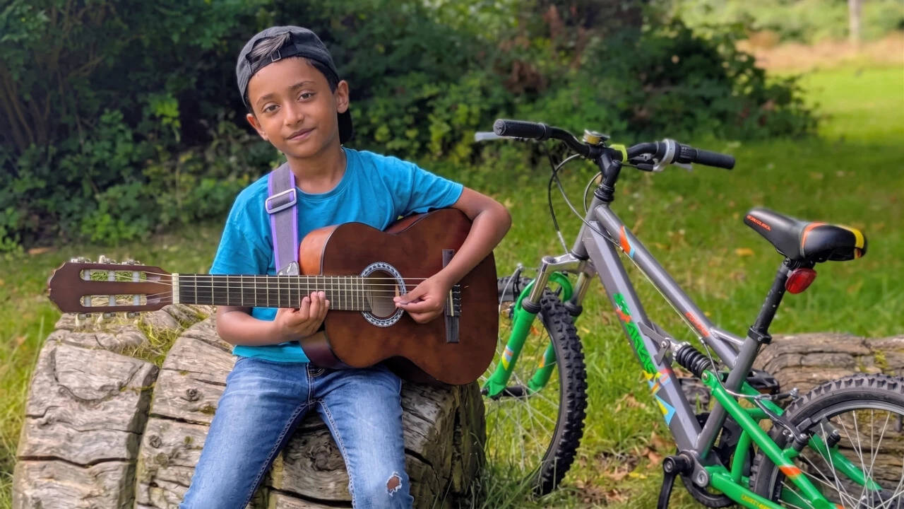 Meet Adrian Abraham, 9, aiming for world record with Grade 8 guitar exam