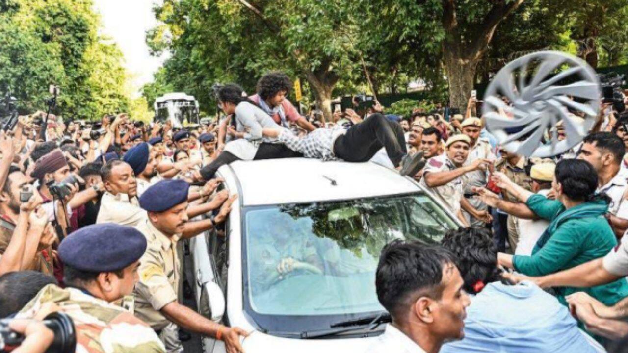 Protesters climb barricades, confront police in march against Gyanesh; 120 detained