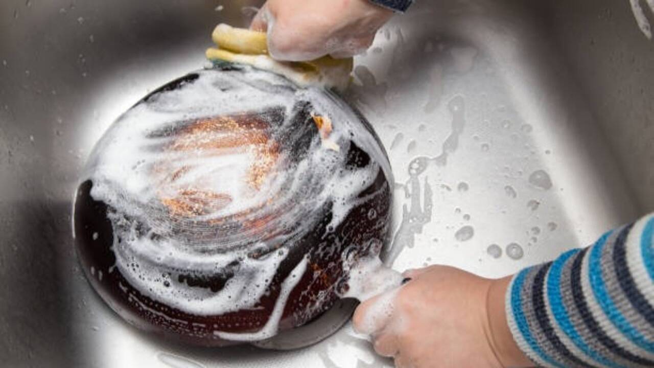 How to clean a burnt pan in minutes: Easy salt, vinegar and baking soda cleaning hack to remove stubborn stains