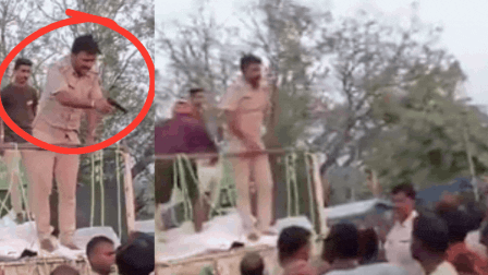 'Gross negligence of duty': Bihar cop suspended after video shows him brandishing pistol during flood relief distribution