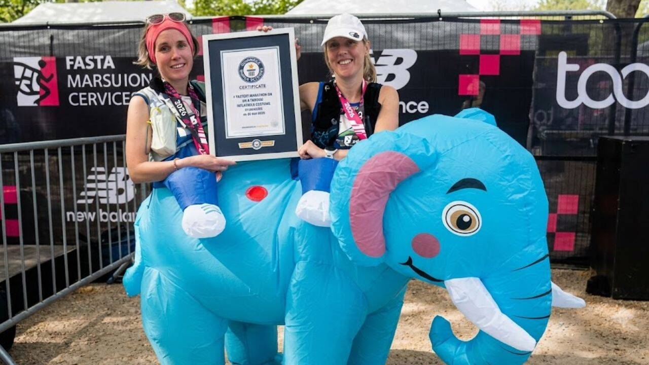 Two runners set a world record in a giant inflatable elephant at the London Marathon