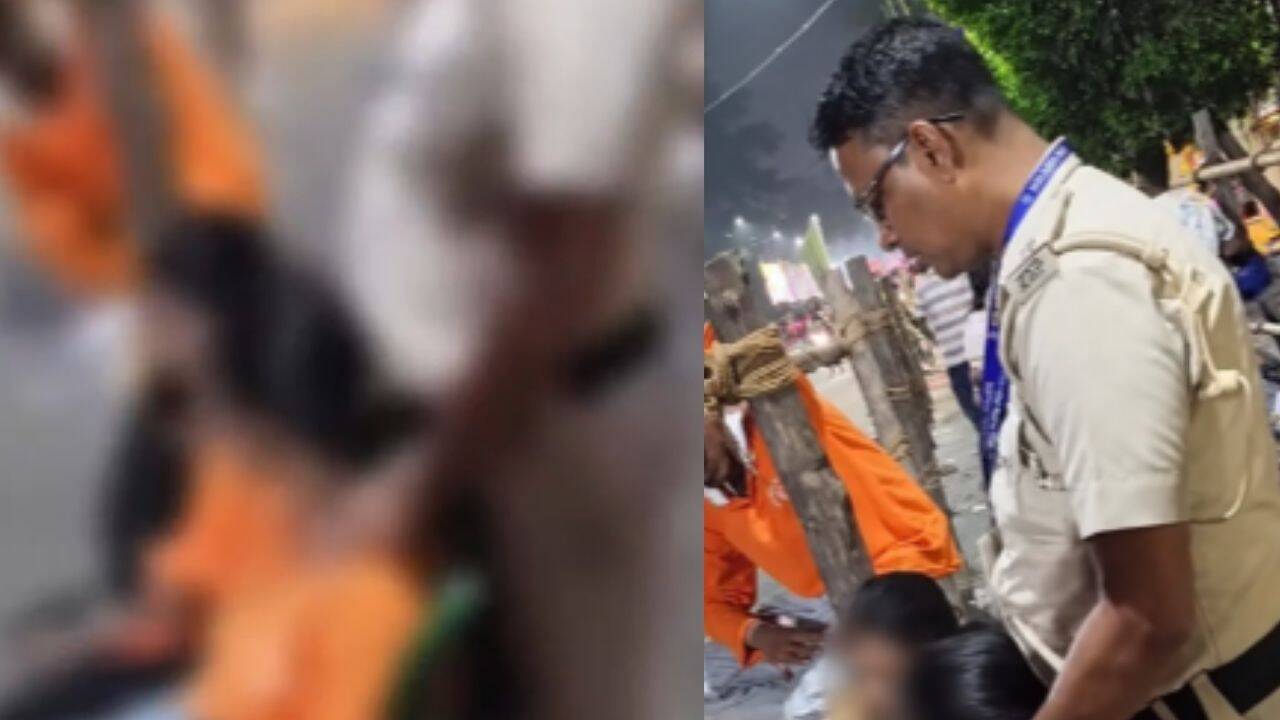 ASI Officer Arrested After Video Shows Harassment of Durga Puja Volunteer