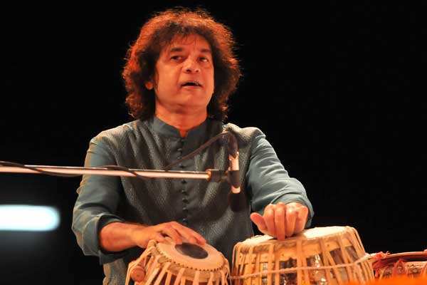 Zakir Hussain: Zakir Hussain performs at a concert in Hyderabad ...