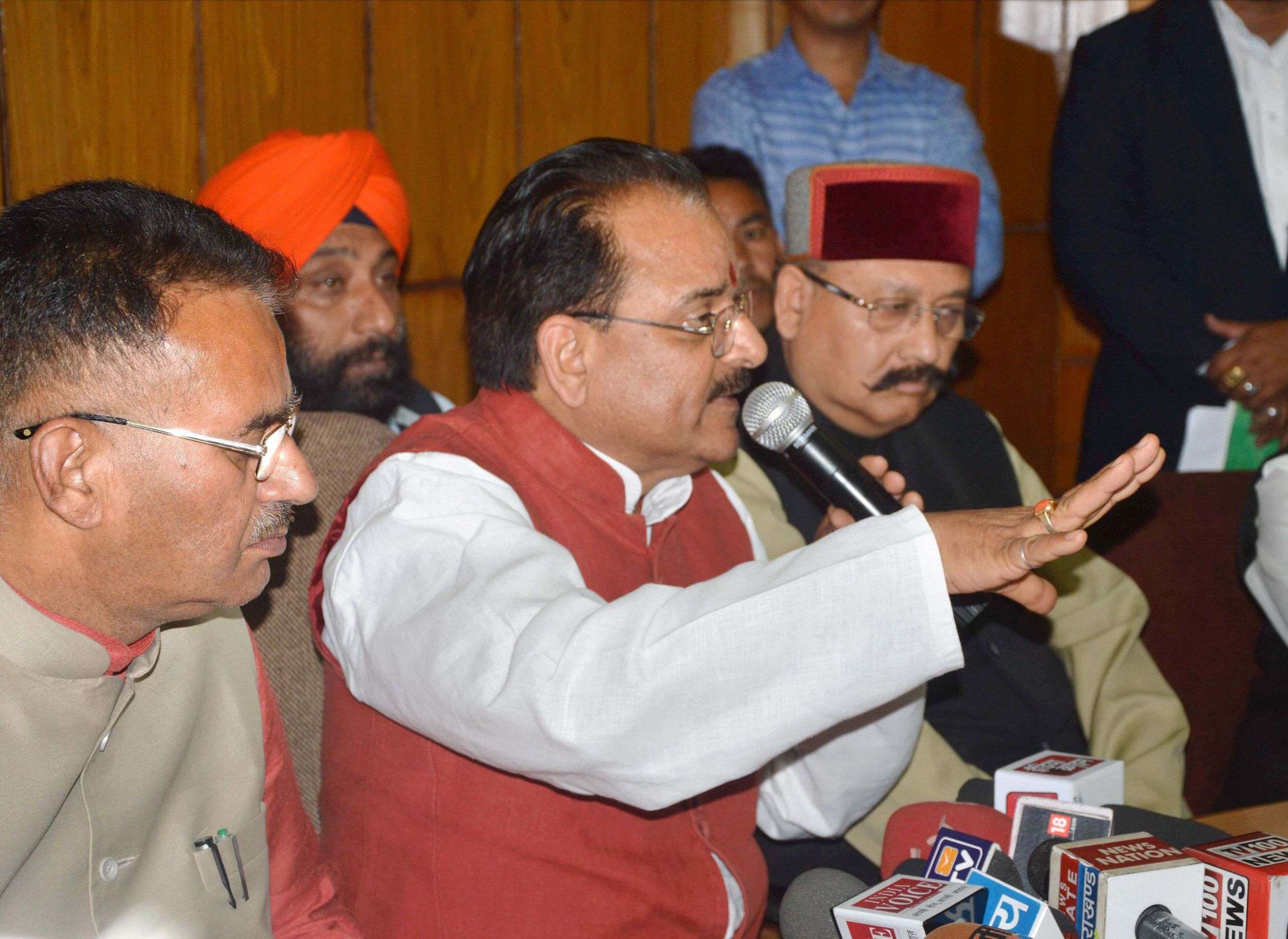 BJP member and leader of opposition in the Uttarakhand assembly Ajay Bhatt addressing a news conference. (PTI photo)