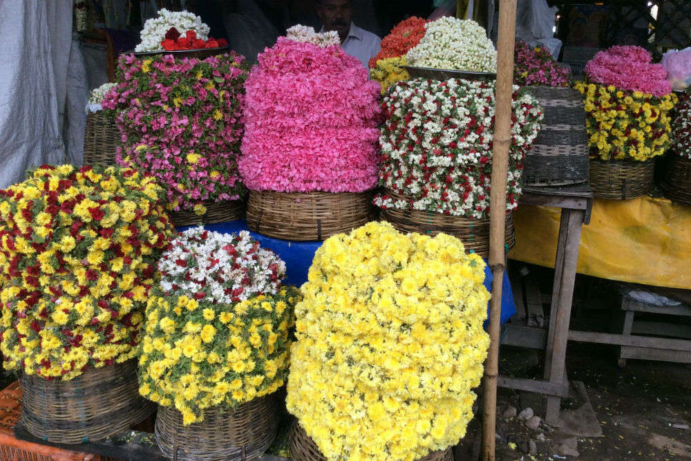Visit the local flower and vegetable markets