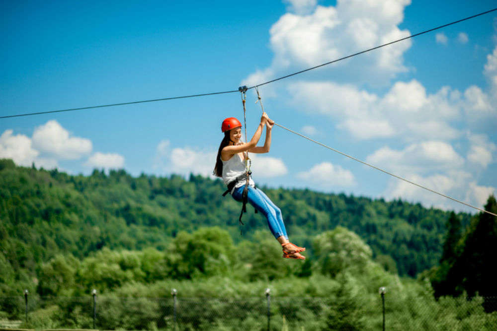 Jump through the trees and fly on a zip line