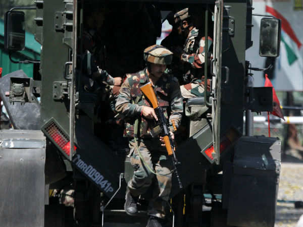 Army personnel arrive at the headquarters at Uri on Sunday