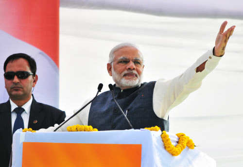 Prime minister Narendra Modi addressing a rally at Dehradun Parade ground. (TOI photo)